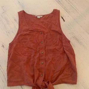 Pink Button down tank top with a tie at the end